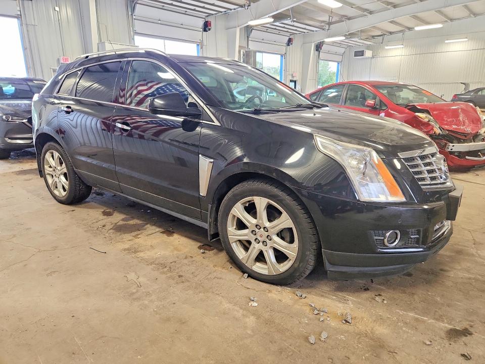 Снимка 4 от търг – 2014 CADILLAC SRX с VIN 3GYFNGE31ES535081
