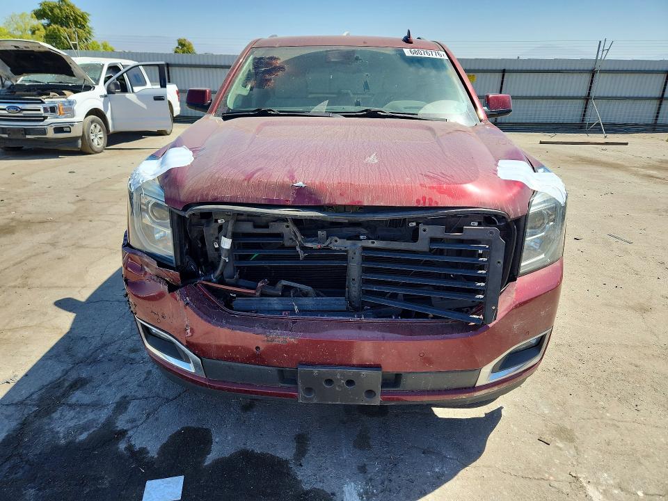 Photo 5 from auction – 2020 GMC YUKON with VIN 1GKS2CKJ8LR219061