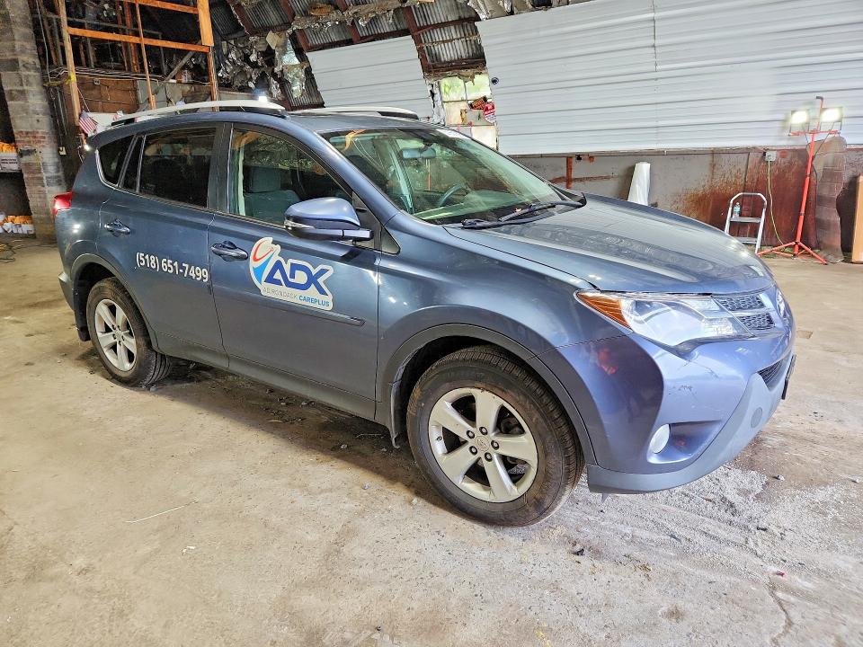 Photo 4 from auction – 2014 TOYOTA RAV4 with VIN JTMRFREV6ED070729