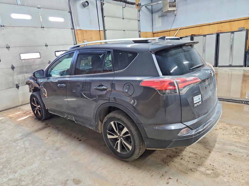 Photo 2 from auction – 2016 TOYOTA RAV4 with VIN 2T3RFREV6GW437764