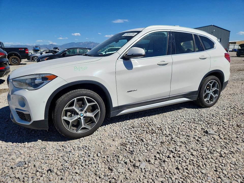 BMW X1 2017 with VIN WBXHT3C37H5F80725 - Photo from auction