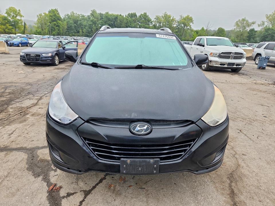 Photo 5 from auction – 2010 HYUNDAI TUCSON with VIN KM8JUCAC3AU023040