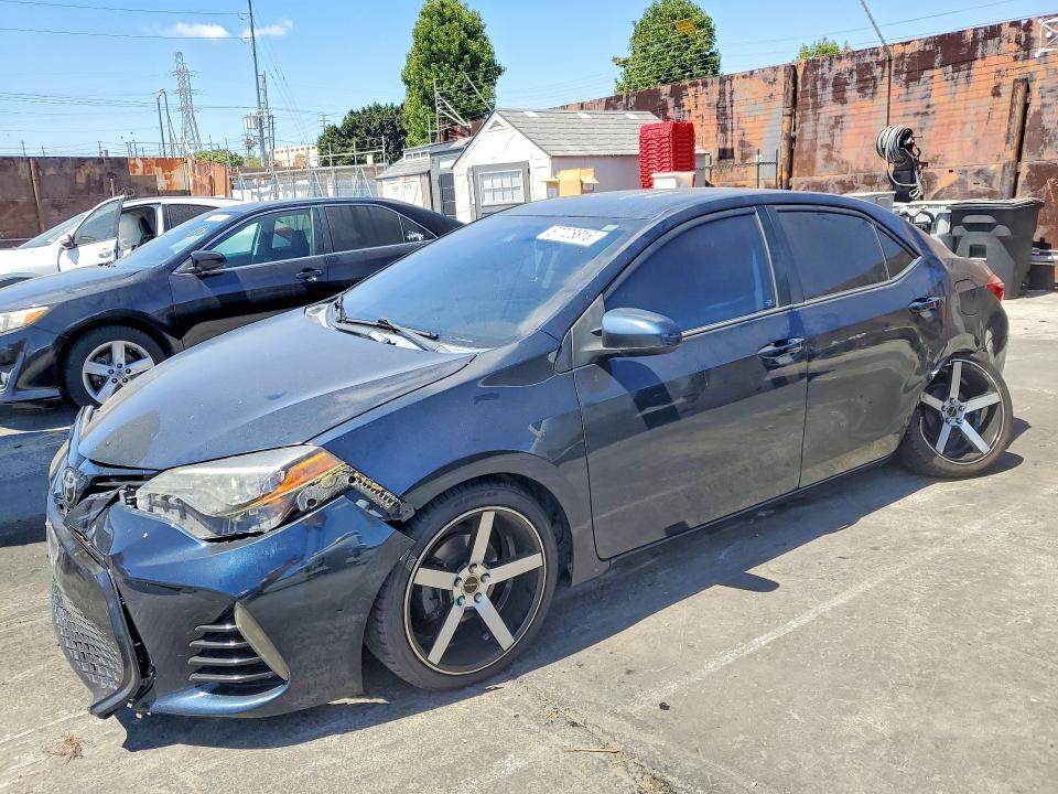 TOYOTA COROLLA 2017 with VIN 2T1BURHE5HC865548 - Photo from auction