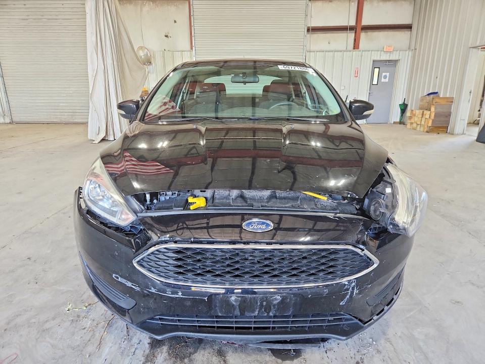 Снимка 5 от търг – 2016 FORD FOCUS с VIN 1FADP3F25GL218957