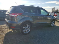 Photo 3 from auction – 2015 FORD ESCAPE with VIN 1FMCU0J96FUC12896