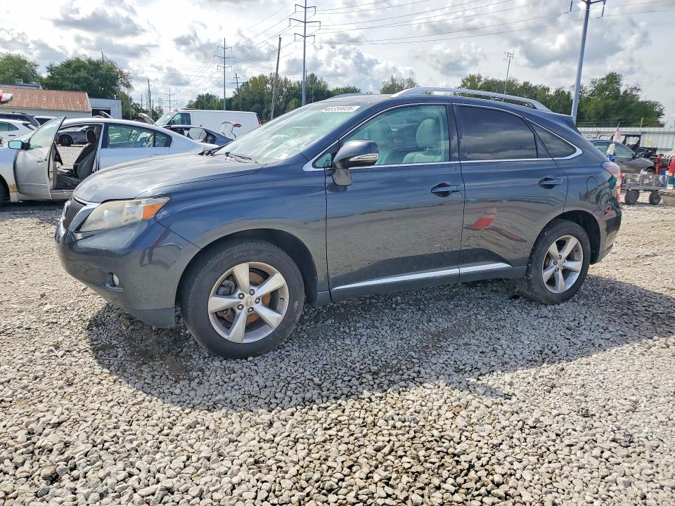 LEXUS RX 2011 with VIN 2T2BK1BA8BC090632 - Photo from auction