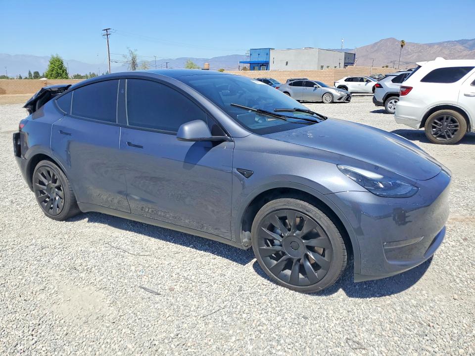 Снимка 4 от търг – 2023 TESLA MODEL Y с VIN 7SAYGDEE6PA196953