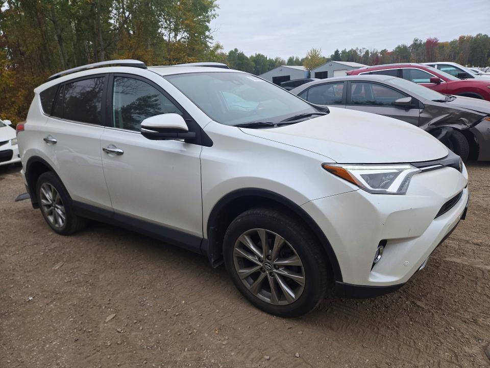 Снимка 4 от търг – 2016 TOYOTA RAV4 с VIN 2T3DFREV6GW448662