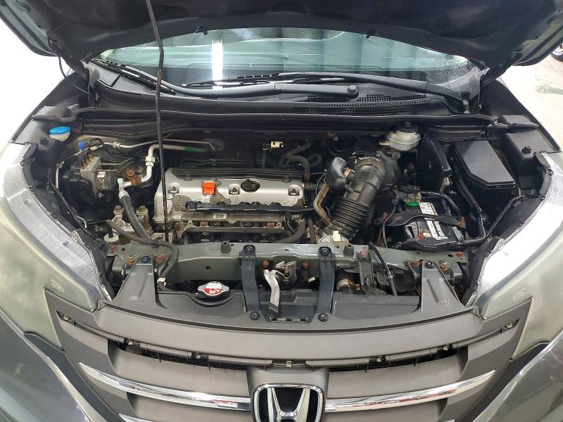 Снимка 12 от търг – 2014 HONDA CR-V с VIN 2HKRM4H33EH620224