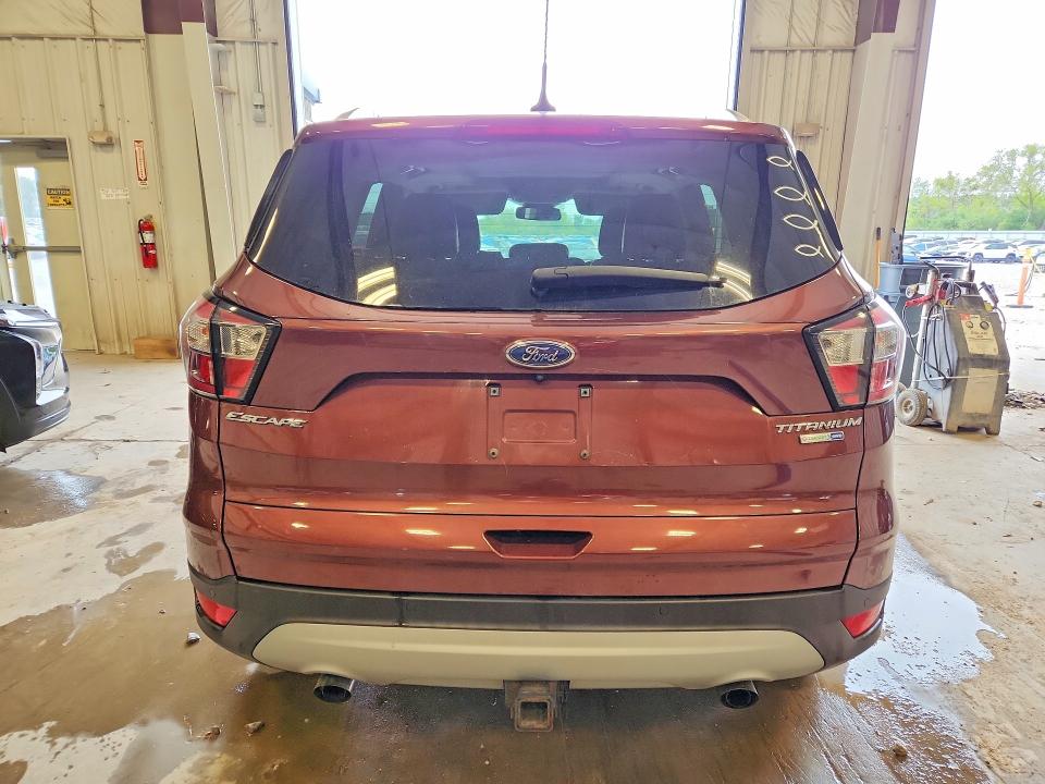 Photo 6 from auction – 2018 FORD ESCAPE with VIN 1FMCU9J98JUB59292
