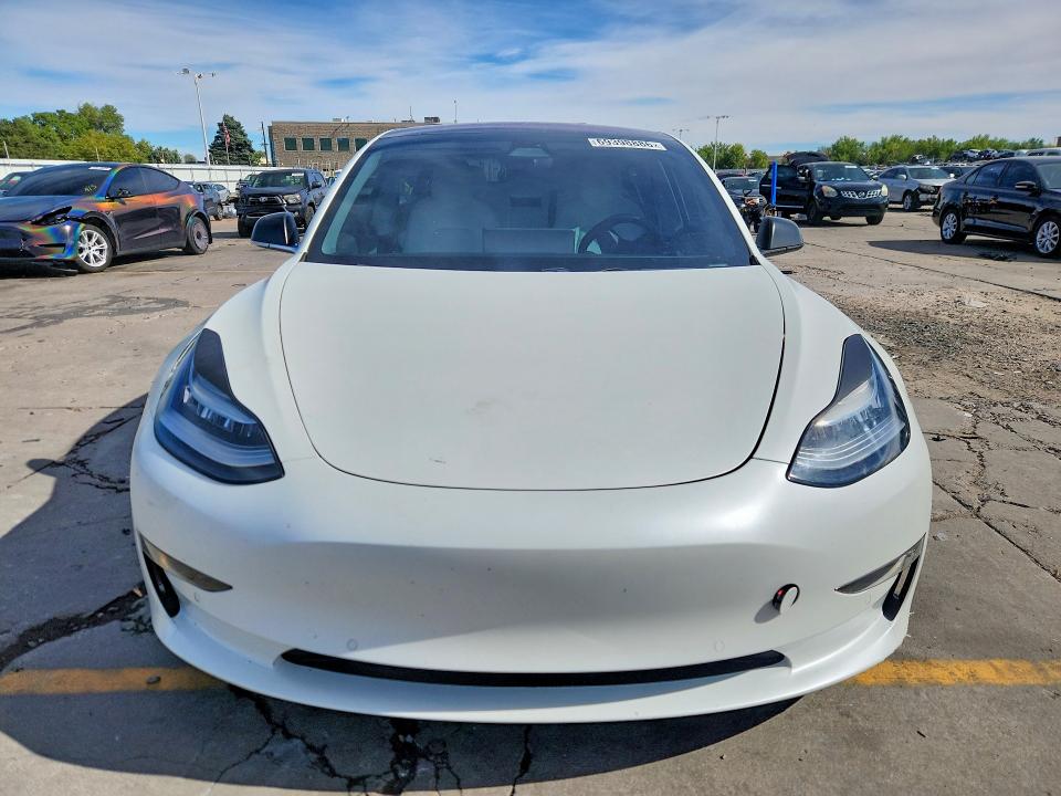 Foto 5 de la subasta – 2018 TESLA MODEL 3 con VIN 5YJ3E1EB9JF134829
