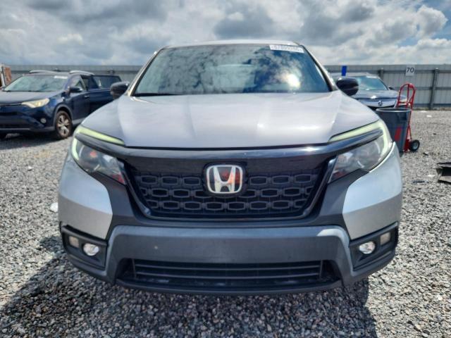 Photo 5 from auction – 2021 HONDA PASSPORT with VIN 5FNYF7H53MB007185