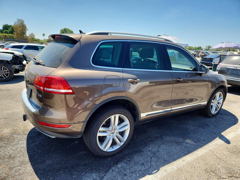 Photo 3 from auction – 2014 VOLKSWAGEN TOUAREG with VIN WVGEP9BP3ED011473