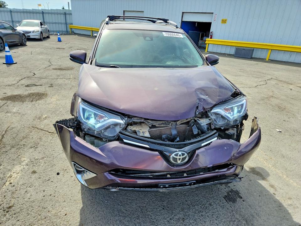 Photo 5 from auction – 2017 TOYOTA RAV4 with VIN 2T3RFREV9HW582511