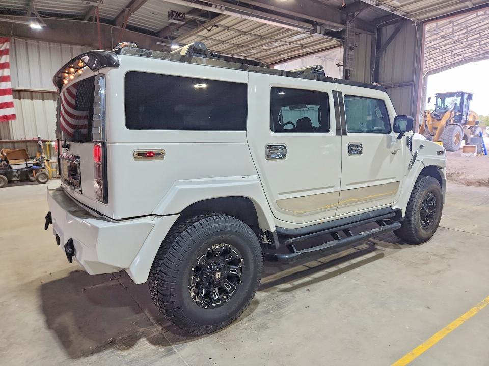 Снимка 3 от търг – 2003 HUMMER H2 с VIN 5GRGN23U93H111998