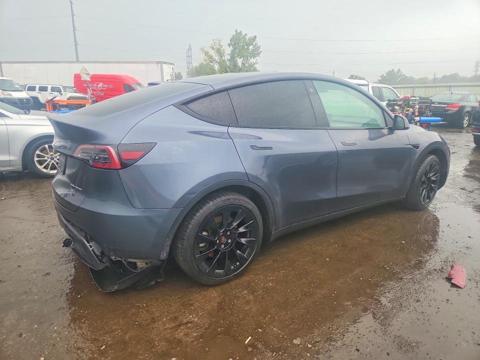 Photo 3 from auction – 2023 TESLA MODEL Y with VIN 7SAYGDEE1PA051481