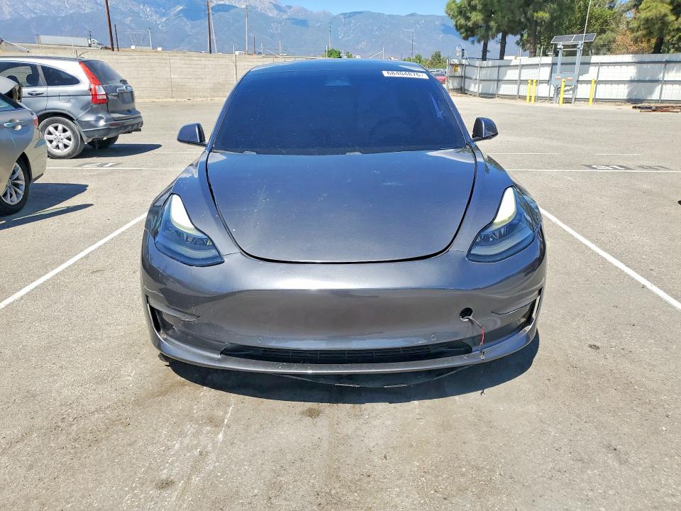Photo 5 from auction – 2021 TESLA MODEL 3 with VIN 5YJ3E1EB6MF937537