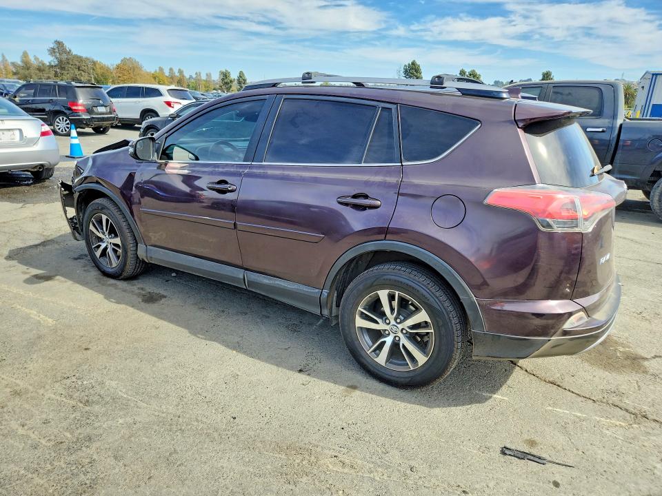 Photo 2 from auction – 2017 TOYOTA RAV4 with VIN 2T3RFREV9HW582511