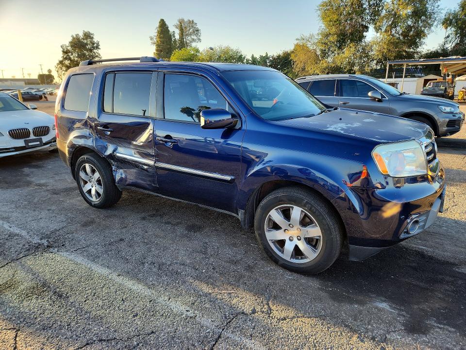 Foto 4 de la subasta – 2014 HONDA PILOT con VIN 5FNYF3H99EB010315
