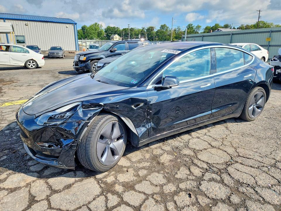 TESLA MODEL 3 2018 with VIN 5YJ3E1EB3JF068262 - Photo from auction