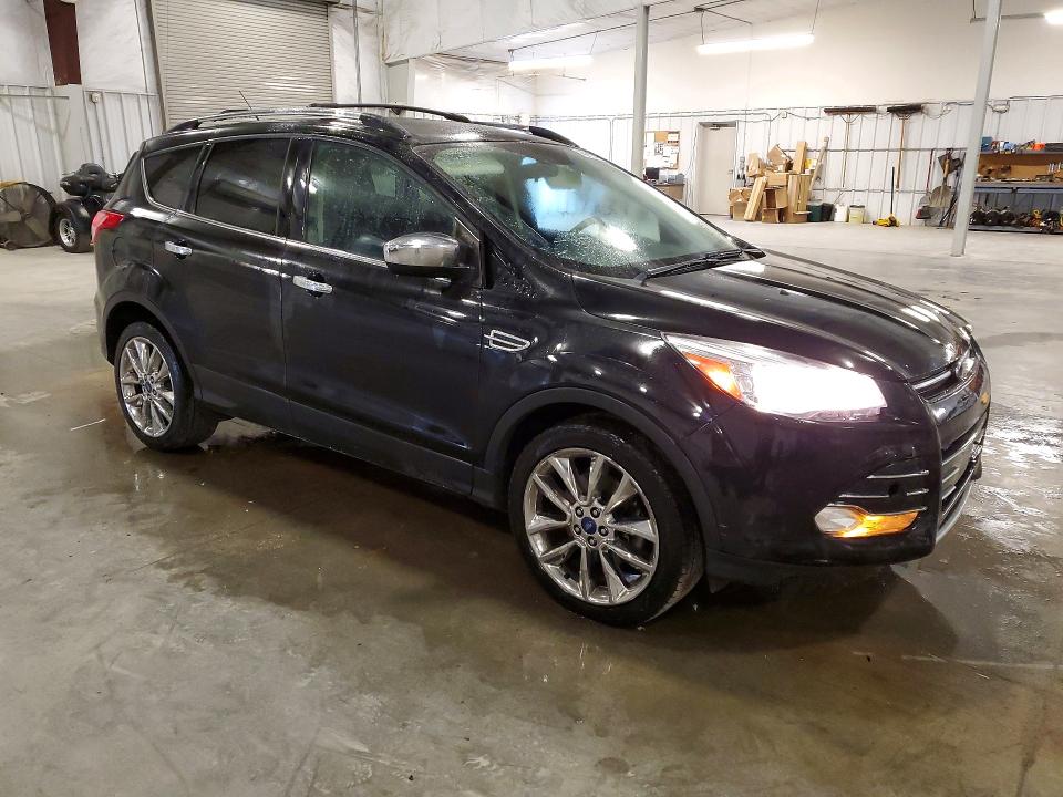 Photo 4 from auction – 2014 FORD ESCAPE with VIN 1FMCU9G9XEUE52947