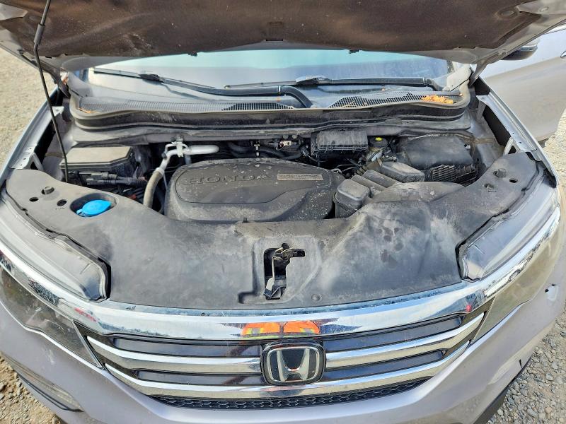 Photo 12 from auction – 2016 HONDA PILOT with VIN 5FNYF6H90GB026830
