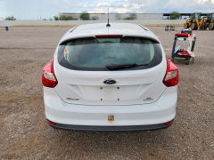 Foto 6 de la subasta – 2014 FORD FOCUS con VIN 1FADP3K2XEL461005