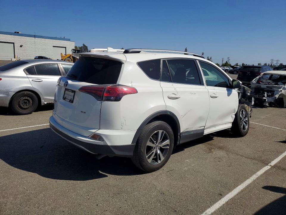 Photo 3 from auction – 2017 TOYOTA RAV4 with VIN JTMWFREV1HJ102057