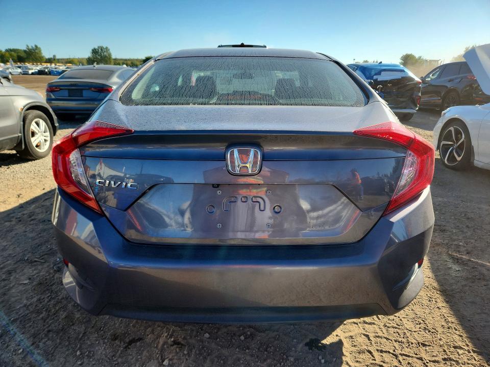 Снимка 6 от търг – 2018 HONDA CIVIC с VIN 2HGFC2F59JH010203