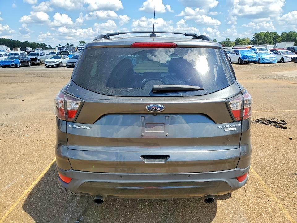 Photo 6 from auction – 2017 FORD ESCAPE with VIN 1FMCU0J98HUA22472