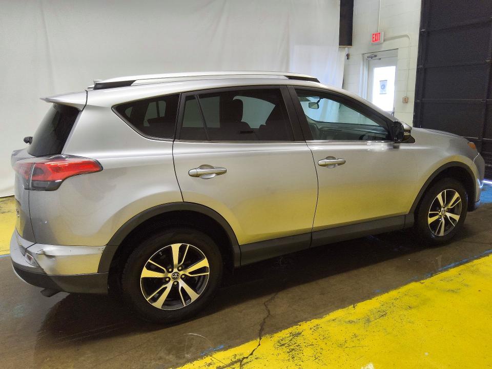 Photo 3 from auction – 2016 TOYOTA RAV4 with VIN 2T3RFREVXGW420689