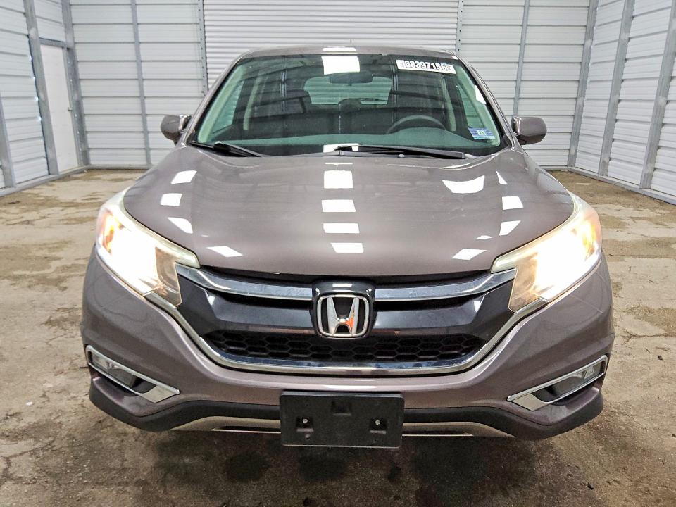 Photo 5 from auction – 2015 HONDA CR-V with VIN 2HKRM4H55FH705181