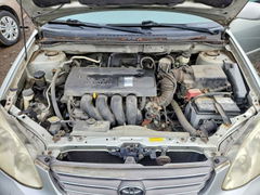 Photo 11 from auction – 2004 TOYOTA COROLLA with VIN JTDBR32E142022284