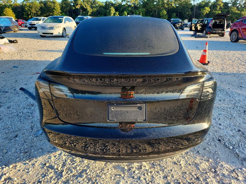 Снимка 6 от търг – 2021 TESLA MODEL 3 с VIN 5YJ3E1EA9MF920304