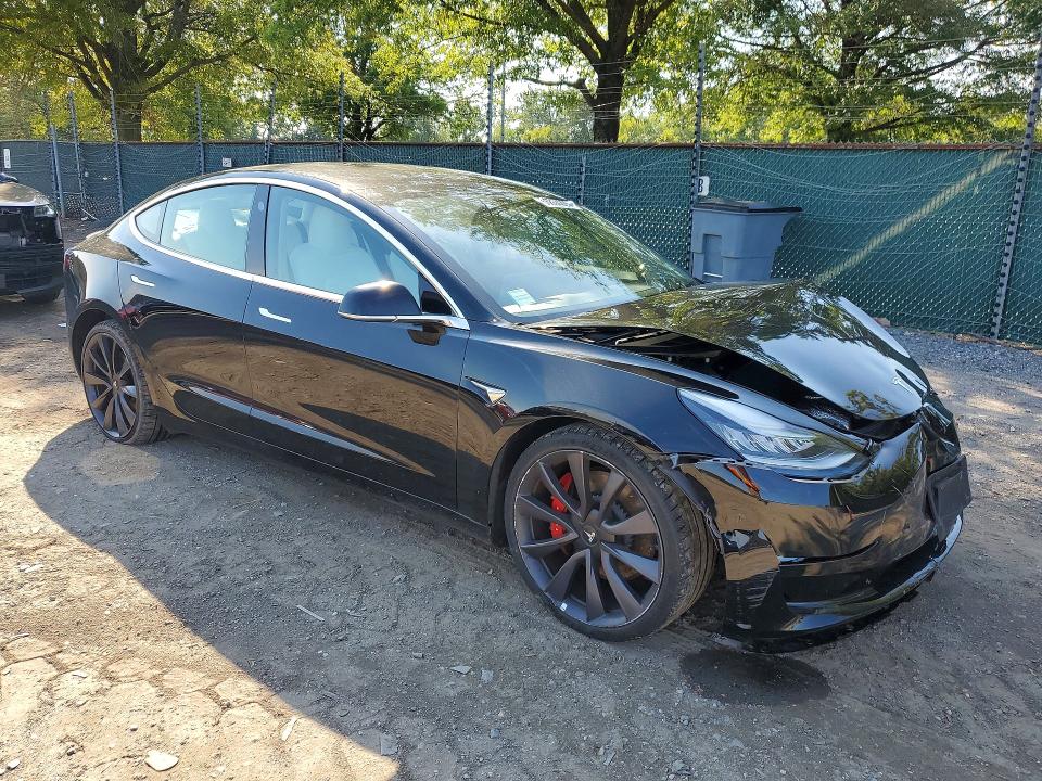 Photo 4 from auction – 2020 TESLA MODEL 3 with VIN 5YJ3E1EC2LF669495
