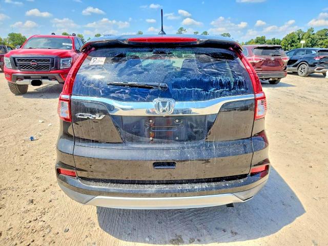 Photo 6 from auction – 2015 HONDA CR-V with VIN 2HKRM3H76FH550927