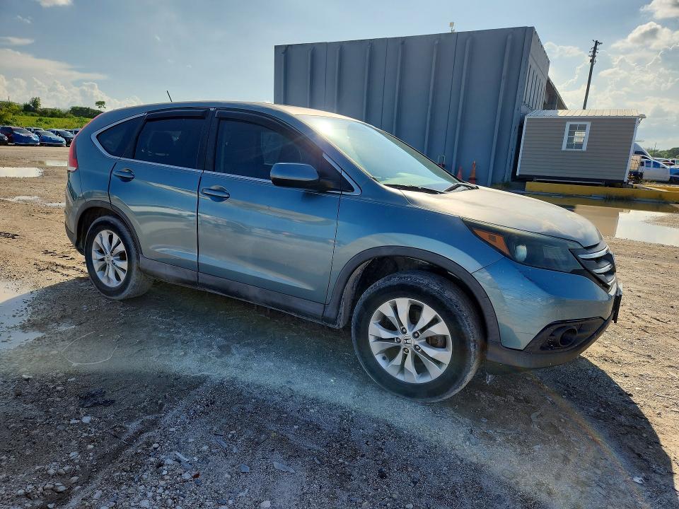 Photo 4 from auction – 2014 HONDA CR-V with VIN 2HKRM3H59EH510564