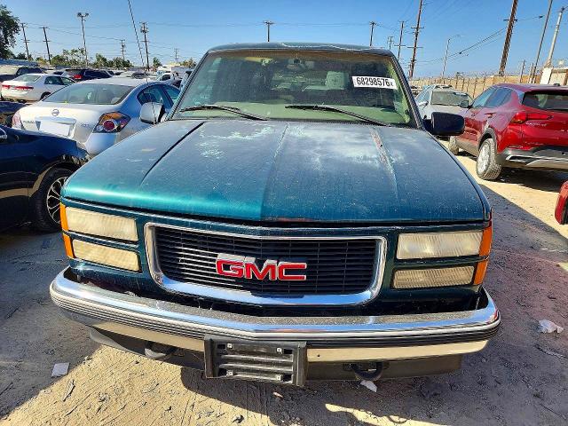 Photo 5 from auction – 1997 GMC SUBURBAN with VIN 3GKFK16R7VG525189