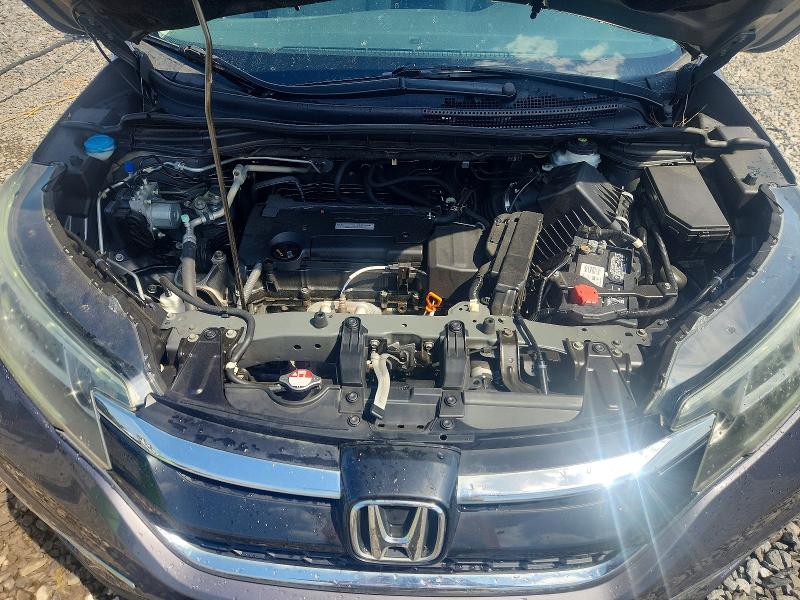 Снимка 12 от търг – 2016 HONDA CR-V с VIN 2HKRM3H72GH513987