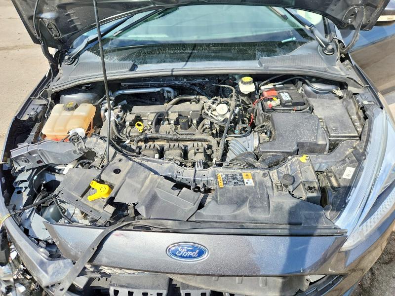 Снимка 11 от търг – 2017 FORD FOCUS с VIN 1FADP3F21HL229388