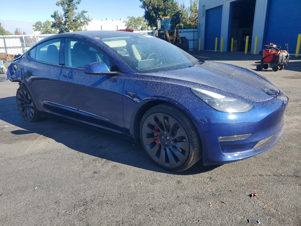 Photo 4 from auction – 2023 TESLA MODEL 3 with VIN 5YJ3E1EC6PF515250