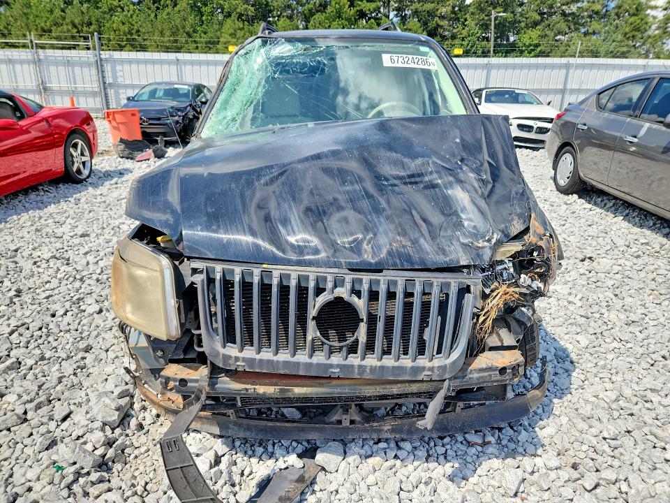 Photo 5 from auction – 2010 MERCURY MARINER with VIN 4M2CN8B71AKJ29209