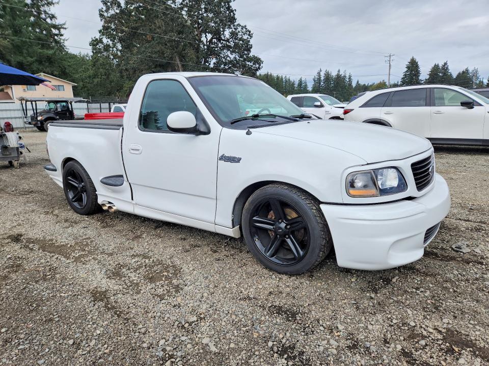 Photo 4 from auction – 2003 FORD F150 with VIN 2FTRF07353CA82925