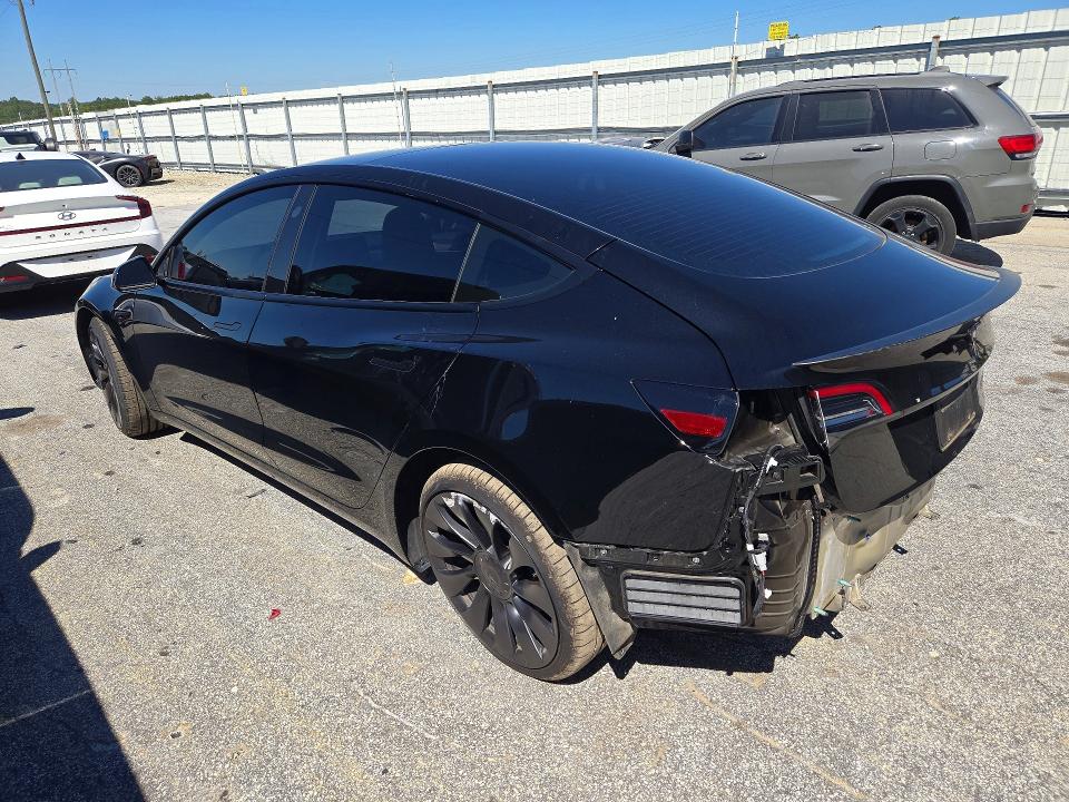 Снимка 2 от търг – 2023 TESLA MODEL 3 с VIN 5YJ3E1EC9PF496726