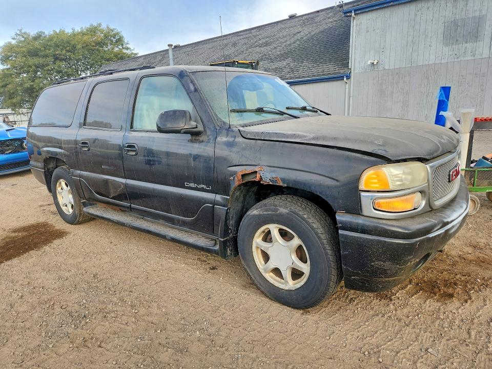 Photo 4 from auction – 2001 GMC DENALI with VIN 1GKFK66U31J186134