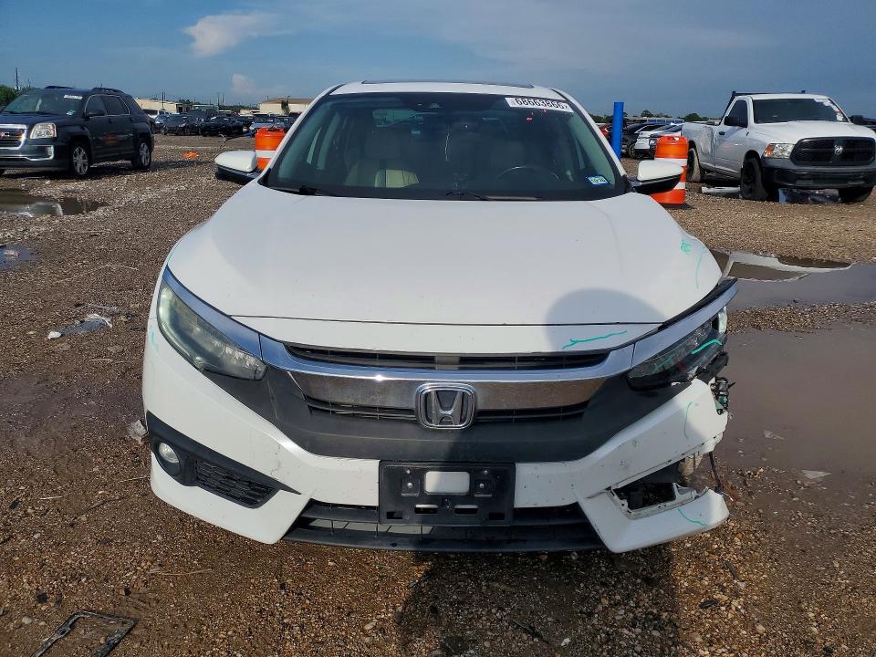 Photo 5 from auction – 2016 HONDA CIVIC with VIN 19XFC1F92GE005392