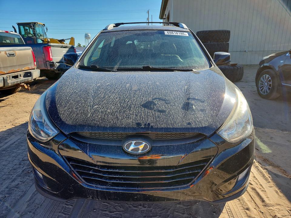 Photo 5 from auction – 2015 HYUNDAI TUCSON with VIN KM8JUCAG3FU036879