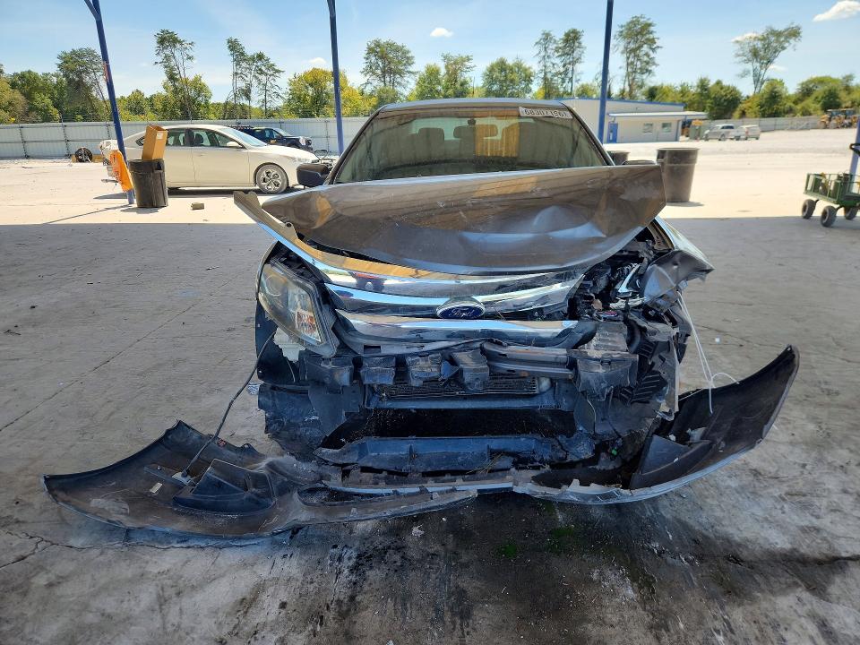 Foto 5 de la subasta – 2011 FORD FUSION con VIN 3FADP0L35BR161908