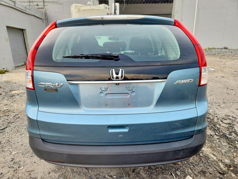 Photo 6 from auction – 2014 HONDA CR-V with VIN 2HKRM4H32EH724624