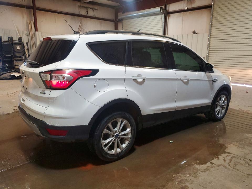 Photo 3 from auction – 2018 FORD ESCAPE with VIN 1FMCU9GD9JUB16561